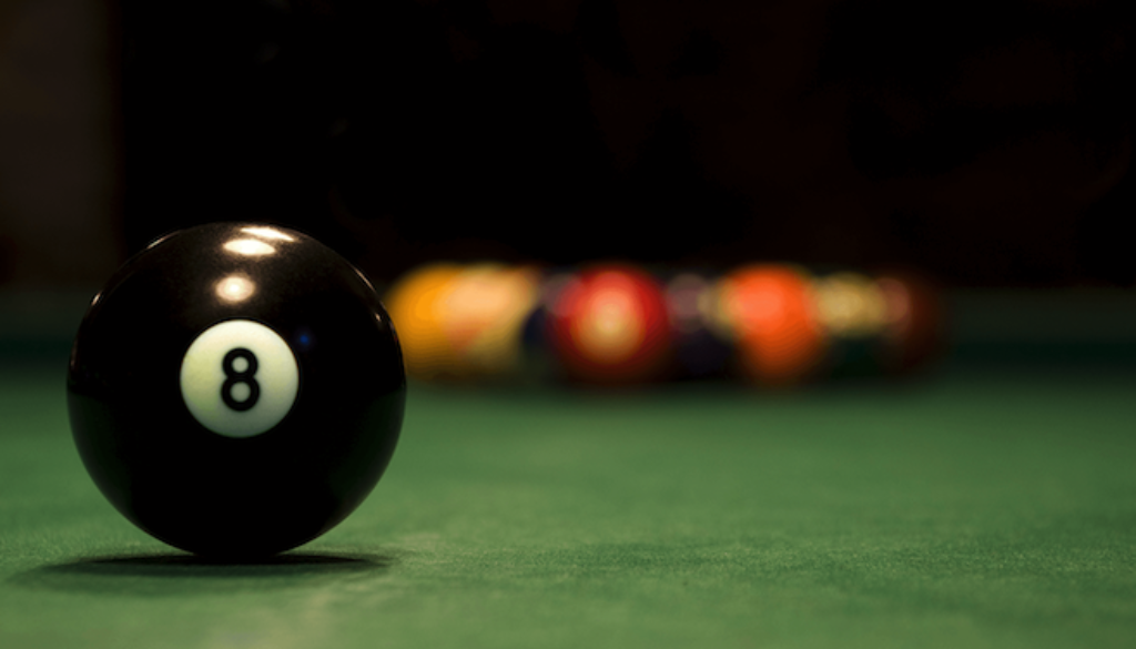 8 ball on a pool table